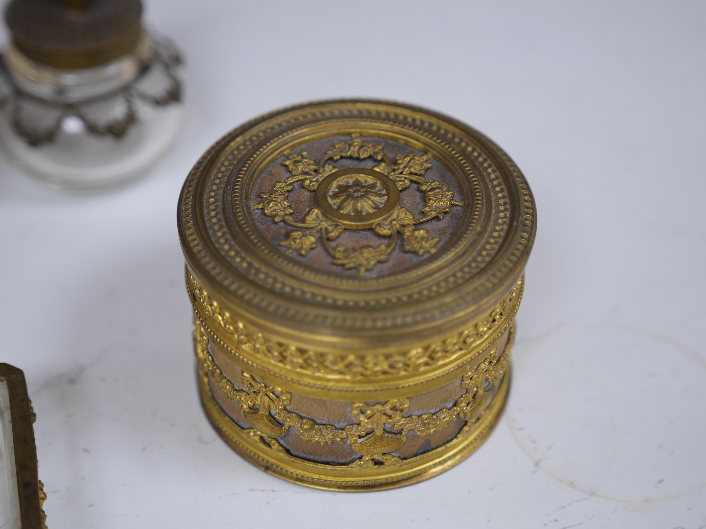 A brass cased carriage clock and five ormolu mounted glass desk accessories, clock 12cm high. Condition - unknown if clock working, desk accessories fair to good condition.